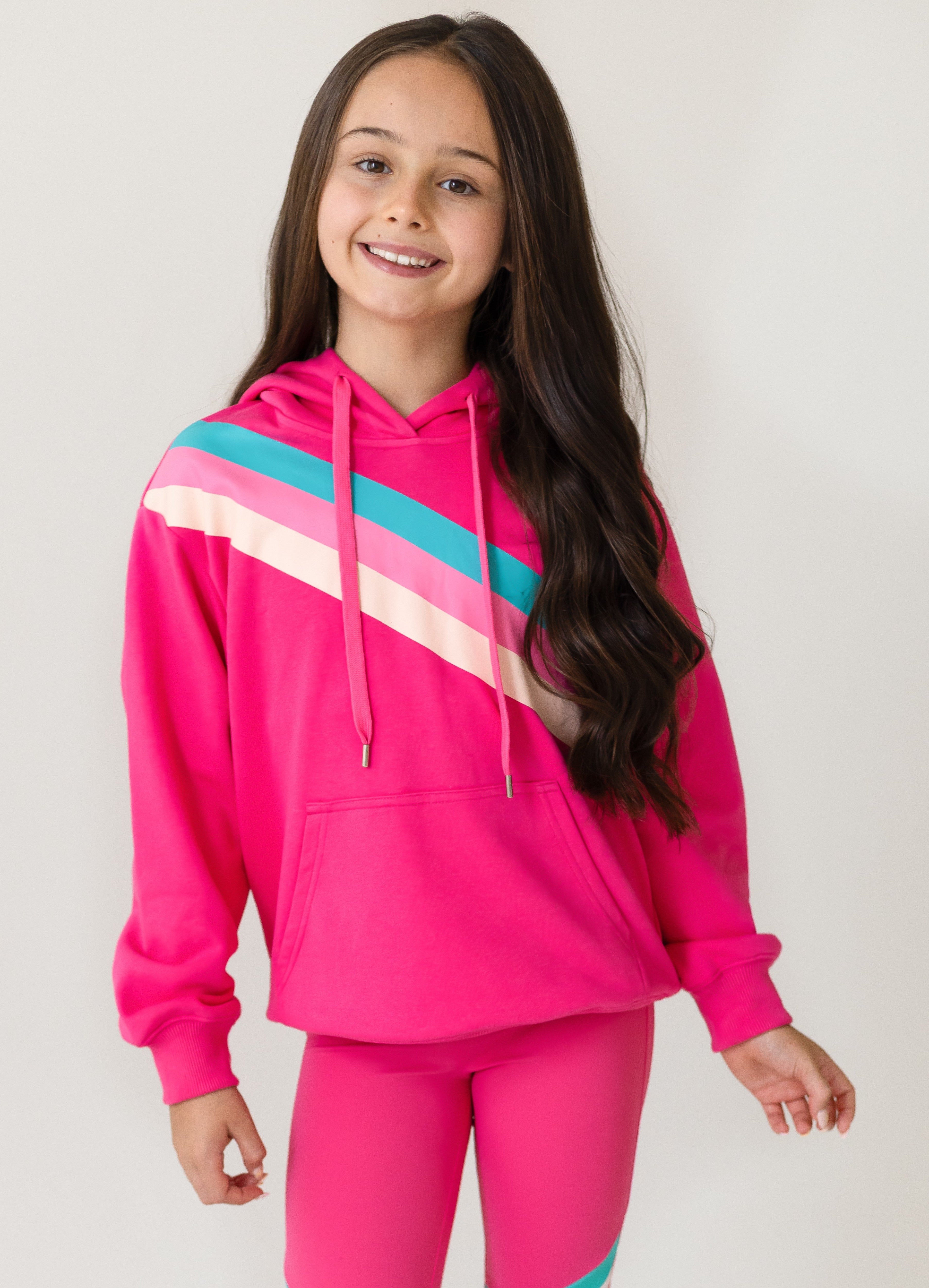 D by Dolly Fushia Oversized Rainbow Jumper the latest girls gym wear and active leisure range for young girls and teenagers, for sports and leisure, gym wear design for kids.